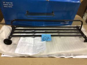 lot 67 image: Antica 24 in. Towel Rack in Rubbed Bronze by MODONA Customer Return See Pictures