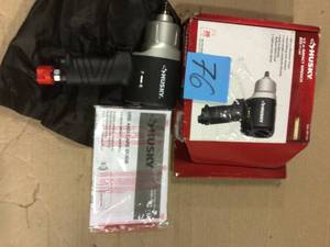 lot 76 image: 800 ft.lbs. 12 in. Impact Wrench by Husky Customer Return See Pictures