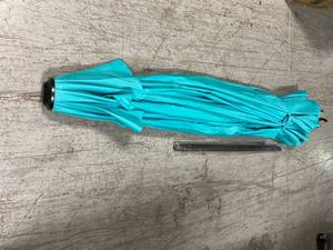 lot 112 image: 11 ft. Market Patio Umbrella with Push Tilt and Crank in Turquoise by Abba Patio Customer Returns See Pictures