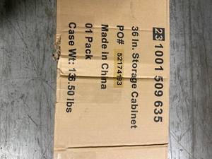 Ready-to-Assemble 24-Gauge Steel Freestanding Garage Cabinet in Black (36 in. W x 72 in. H x 18 in. D) by Husky Customer Returns See Pictures