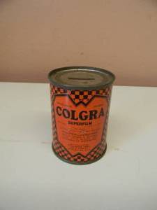lot 48 image: VINTAGE COLGRA SUPERFILM ADVERTISING OIL CAN COIN BANK - NICE - GREAT PIECE - SEE PICTURES