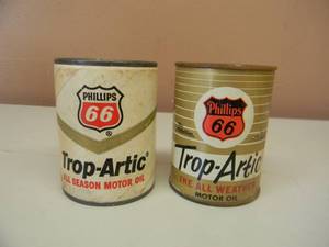 lot 49 image: 2 - VINTAGE PHILLIPS 66 TROP-ARTIC ADVERTISING OIL CAN COIN BANKS - NICE - GREAT SET - SEE PICTURES