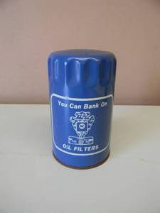 lot 59 image: RARE - VINTAGE AC OIL FILTERS ADVERTISING COIN BANK - AWESOME PIECE - APPROX 5 - SEE PICTURES