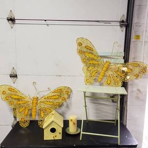 lot 5 image: Metal Folding Chair, 2-32 Metal butterflies, Ceramic Bird House & Candle