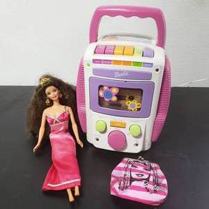 lot 7 image: Barbie Sing A Long KaraokeCassette Player (Works), Barbie Doll & Coin Purse