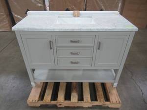 lot 29 image: Home Decorators Collection Everett 49 in. W x 22 in. D Vanity Cabinet in Grey with Carrara Marble Vanity Top in White with White Basin EEGVT4922D