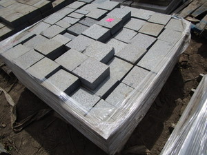 lot 81 image: Granite pavers, mostly 6x6x2.5, ...