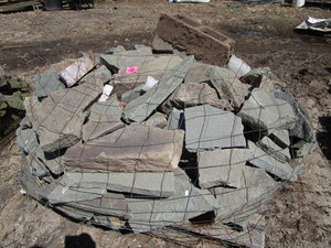 lot 180 image: Rubble wall, wire bundle...