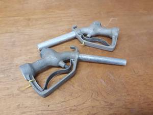 lot 27 image: Pair of Antique Aluminum Gas Pump Handles