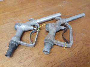 lot 28 image: Pair of Antique Aluminum Gas Pump Handles