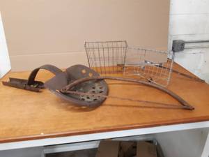 lot 32 image: Steel Tractor Seat, Bicycle Basket and Antique Tree Saw