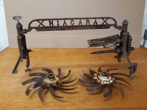 lot 34 image: NIAGARA Cast Iron Decorative Piece and 2 Rotary Hoes