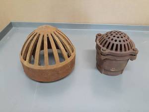 lot 52 image: Pair of Cast Iron Drain Covers