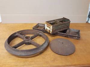 lot 58 image: Large Cast Iron Wheel, Parts Tubs and More