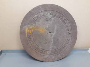 lot 62 image: Cast Iron Knapp & Spencer Sioux City IA Drain Cover