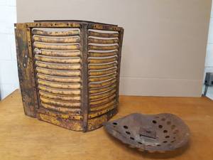 lot 67 image: Antique Tractor Grill and Stamped Tractor Seat