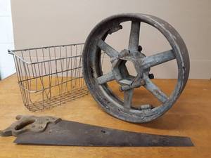 lot 78 image: Large Pulley  Wheel, Basket and Hand Saw