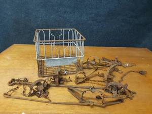 lot 166 image: Lot of 9 Vintage Traps and Steel Marigold Dairy Crate