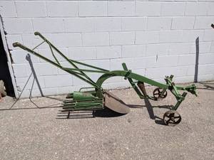 lot 102 image: Antique John Deere Potato Digger