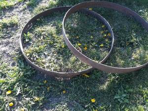lot 5 image: Pair of Antique Steel Bands for Wood Wagon Wheels