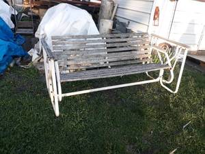 lot 44 image: Porch  Patio Swing - Wood needs to be replaced