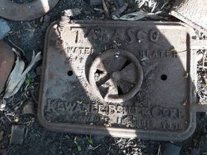 lot 27 image: Large Lot of Cast Iron Pieces from Stoves, Boilers and More - Tabasco Water Heater - Kewanee IL