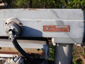 lot 31 image: Delta Rockwell Radial Arm Saw Mounted on Axle w hitch - Model 5541