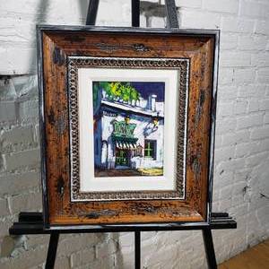 lot 118 image: Sunny Spanish Store Front