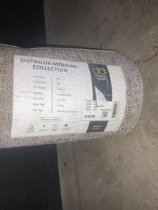 lot 23 image: UNIQUE LOOM INDOOROUTDOOR NEW YORK IVORY 50 X 80 AREA RUG. SEE PICTURES