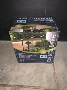 lot 39 image: HAMPTON BAY LOW-VOLTAGE BRONZE OUTDOOR INTEGRATED LED LANDSCAPE PATH LIGHT AND FLOOD LIGHT KIT (8-PACK). SEE PICTURES