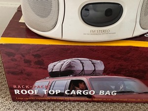 lot 8 image: Anxius Roof Top Cargo Bag and Aiwa RadioCD Player