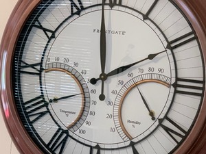 lot 52 image: Decorative Wall Clock by Frontgate