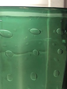 lot 24 image: Pretty Green Glass Vase