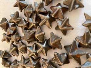 lot 184 image: Vintage Metal Stars in a Vintage Folgers Coffee Can