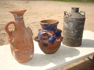 lot 18 image: Metal Milk Jug and terra cotta pot