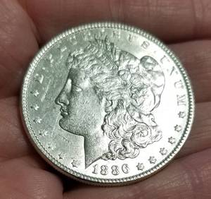 1886 MORGAN SILVER DOLLAR CLEANED