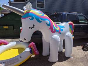 lot 32 image: Unicorn Blow Up Pool and Unicorn Blow Up Water Rider