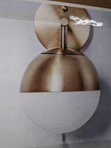 lot 64 image: Project 62 Brass Finish Wall Light