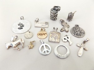 lot 64 image: 24.5 Grams of .925 Sterling Silver Charms and Small Pendants