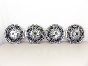 lot 26 image: Lot of 4 Vintage Chrome Corvette Hub Caps