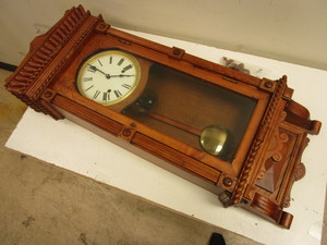 lot 502 image: TIME AND STRIKE WALL CLOCK