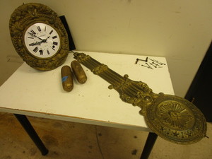 lot 504 image: ANTIQUE MORBIER FRONTENEAU BRASS CLOCK WITH PENDLUM AND WEIGHTS