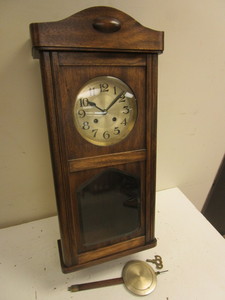 lot 518 image: TIME AND STRIKE WALL CLOCK