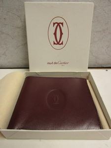 lot 605 image: VINTAGE CARTIER LEATHER WALLET