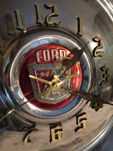 lot 150 image: Rusty Nut Battery Operated Ford Hubcap Clock