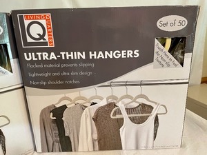 lot 284 image: 100 Living Quarters Ultra Thin Covered Hangers