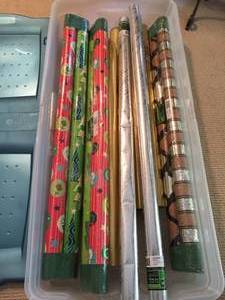 lot 412 image: Large Giftwrap Lot In Rubbermaid Bin