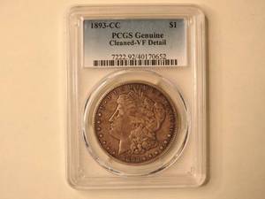 lot 3 image: 1893 CC Carson City Morgan Dollar, graded PCGS Genuine Cleaned VF Detail