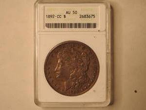 lot 9 image: 1892 CC Carson City Morgan Dollar, AU 50 Graded by ANACS