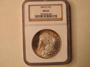 lot 11 image: 1885 CC Carson City Morgan Dollar NGC graded MS 64